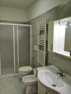 Koupelna v ubytování Borgo Family Suite + 2 fotografie