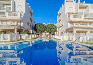 Πισίνα στο ή κοντά στο Las Dunas Duplex Apartment Javea Arenal by Rock Rentals