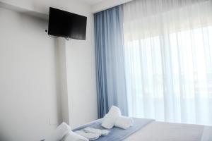 TV/trung tâm giải trí tại Arfaras Home