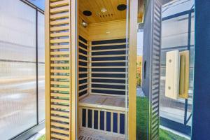 a small house with a sauna on the side of it at Modern Villa w jacuzzi sauna&garden in Los Angeles