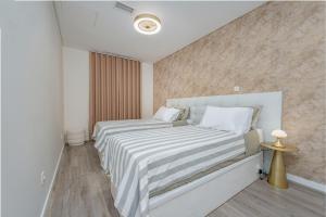 Katil atau katil-katil dalam bilik di Better together funchal 2