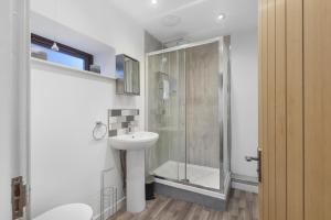 Et badeværelse på Lobster Lodge - North East Escapes + 8 billeder