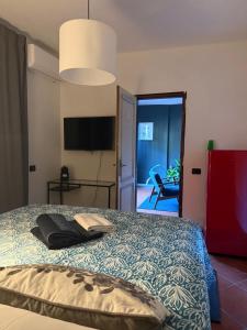 Postel nebo postele na pokoji v ubytování B&B RIO GRANDE