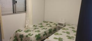 En eller flere senge i et værelse på CAMPO & NATURALEZA uy