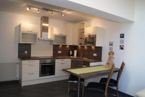 A kitchen or kitchenette at Haus Erika