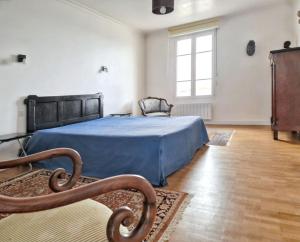 Postel nebo postele na pokoji v ubytování Maison pittoresque à Camaret sur Mer avec vue sur mer
