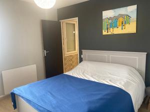 Postel nebo postele na pokoji v ubytování MOCY La Maison
