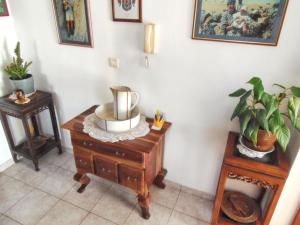 a room with a table with a blender on it at Welcoming apartment in Medulin - 75 sqm with view in Medulin +12 photos