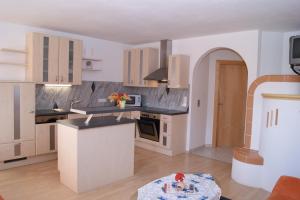 A kitchen or kitchenette at Haus Erika