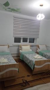 Postel nebo postele na pokoji v ubytování Ademi guest House