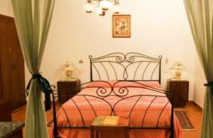 מיטה או מיטות בחדר ב-Podere Il Fattoio