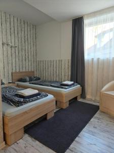 Postel nebo postele na pokoji v ubytování RIEDWIRTSHAUS