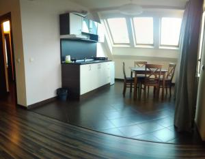 Kuchyň nebo kuchyňský kout v ubytování City Blagoevgrad Family Hotel