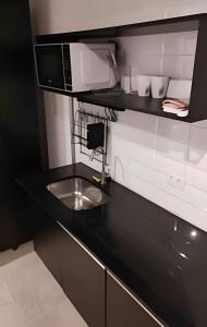 Kuchyň nebo kuchyňský kout v ubytování Studiohaus Alvorada