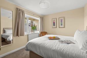 Ένα ή περισσότερα κρεβάτια σε δωμάτιο στο The Flat, Hillcroft for 2 guests