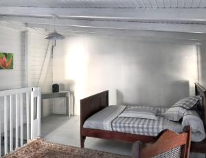 Posezení v ubytování Appartement cosy au Carbet avec balcon et vue sur mer - 70 m²