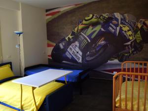 A bed or beds in a room at Rental rooms Antonella