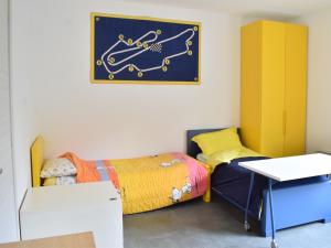 A bed or beds in a room at Rental rooms Antonella