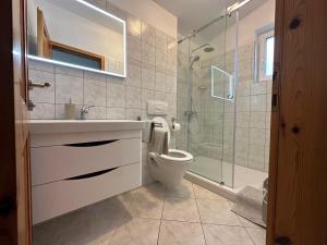 Koupelna v ubytování Apartments Bacak