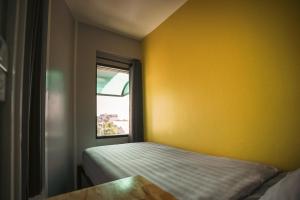 Ein Bett oder Betten in einem Zimmer der Unterkunft Stamps Backpackers