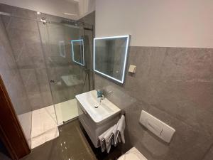 Koupelna v ubytování Apartments Bacak