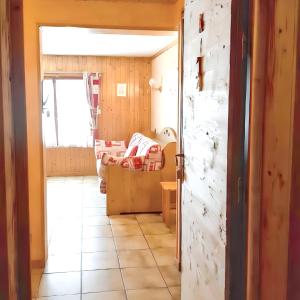Katil atau katil-katil dalam bilik di Studio cosy à Les Gets 25 m² avec vue montagne