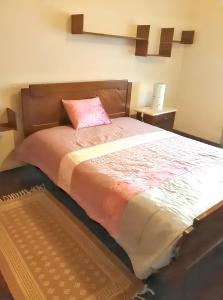 Katil atau katil-katil dalam bilik di Sea View Apartment in Peniche