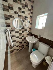 Koupelna v ubytování R3 Single room with shared bathroom