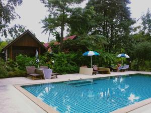 The swimming pool at or close to Krathom Khaolak Resort