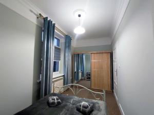Postel nebo postele na pokoji v ubytování Apartamenty u Antka
