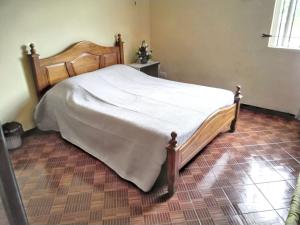 Ένα ή περισσότερα κρεβάτια σε δωμάτιο στο Charming Apartment in Grand Baie with Pool