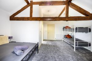 Katil atau katil-katil dalam bilik di Snowdrop Barn I Hot Tub, Games Room, Pets welcome!