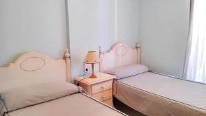 Posteľ alebo postele v izbe v ubytovaní Spacious apartment in Calpe of 100 m² with shared pool! + 18 fotografií