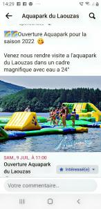 a screenshot of a webpage of people on a raft on the water at Maison accueillante à La Salvetat-sur-Agout avec terrasse in La Salvetat