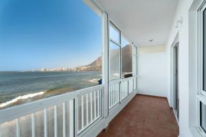 a balcony with a view of the ocean at Apto Bajamar Seaview in Bajamar