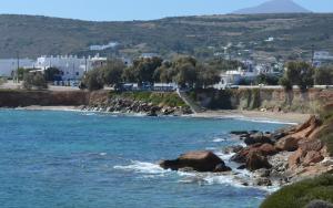 a view of a beach with rocks and houses at Seaview Ampelas Studio in Ambelas