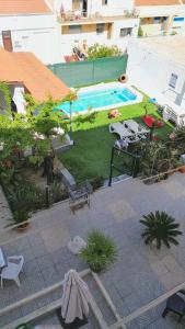 Бассейн в Comfortable Apartment in Feijó with Shared Pool, 90 m² или поблизости