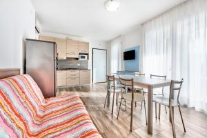 Kuchyň nebo kuchyňský kout v ubytování Jesolo Village Beach House - Host Solution