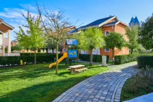 Herní místnost nebo prostor pro děti v ubytování Jesolo Village Beach House - Host Solution