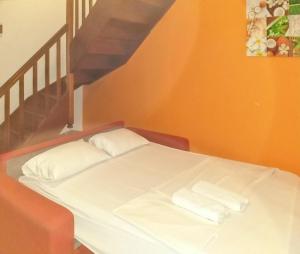 Postel nebo postele na pokoji v ubytování Appartement moderne à Sainte-Anne - Piscine & Jardin - 80 m²