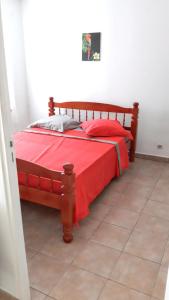 En eller flere senge i et værelse på Appartement lumineux aux Abymes, 56 m², terrasse et parking