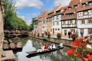 a group of people riding in a boat down a river at Appartement charmant à Jebsheim avec terrasse et jardin in Jebsheim