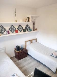 Postel nebo postele na pokoji v ubytování Cosy Apartment in Villaviciosa de Odón with Shared Pool