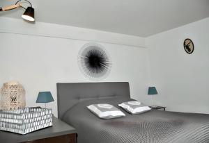 Ένα ή περισσότερα κρεβάτια σε δωμάτιο στο Maison confortable proche des pistes à Sainte-Marie de Campan