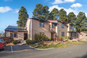 a house with a car parked in front of it at Causeway 3026 in Pagosa Springs