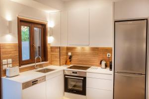 Kuchyň nebo kuchyňský kout v ubytování Lithos House & Spa + 18 fotografií