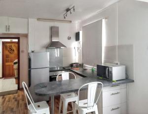 Kuchyň nebo kuchyňský kout v ubytování Comfortable apartment in Grand Baie, 31 m², shared pool + 3 fotografie