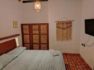 Postel nebo postele na pokoji v ubytování Casa VaraEchada en Barichara
