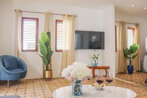TV a/nebo společenská místnost v ubytování Sapphire Residence
