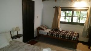 Postel nebo postele na pokoji v ubytování Refugio del Solís + 37 fotografií
